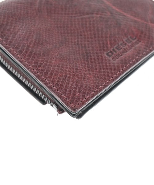 DIESEL กระเป๋าสตางค์/กระเป๋าใส่เหรียญ