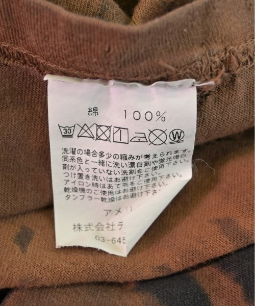 TOTALLY BLOWN เสื้อยืด/เสื้อท็อปส์