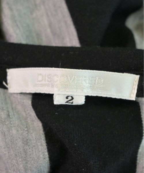 DISCOVERED เสื้อยืด/เสื้อท็อปส์