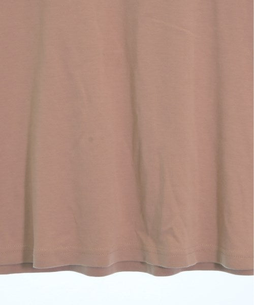 FILA เสื้อยืด/เสื้อท็อปส์