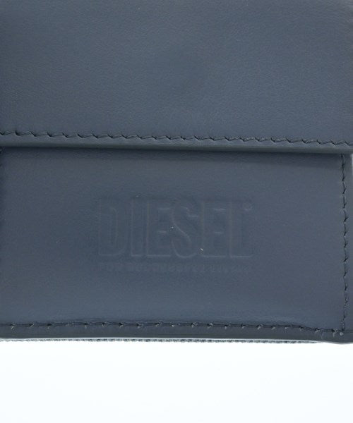 DIESEL กระเป๋าสตางค์/กระเป๋าใส่เหรียญ