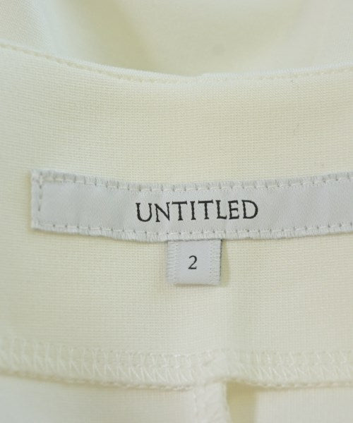 UNTITLED เสื้อยืด/เสื้อท็อปส์
