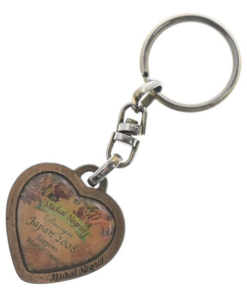 Michal Negrin เครื่องประดับบนกระเป๋า