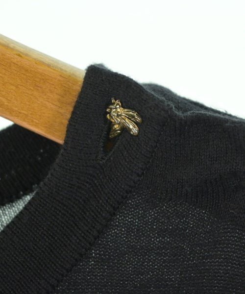 Porter des boutons เสื้อกันหนาว