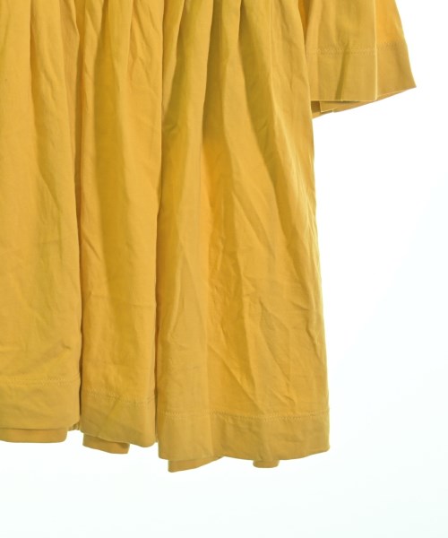 DEMYLEE เสื้อยืด/เสื้อท็อปส์