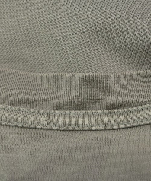ATTACHMENT เสื้อยืด/เสื้อท็อปส์