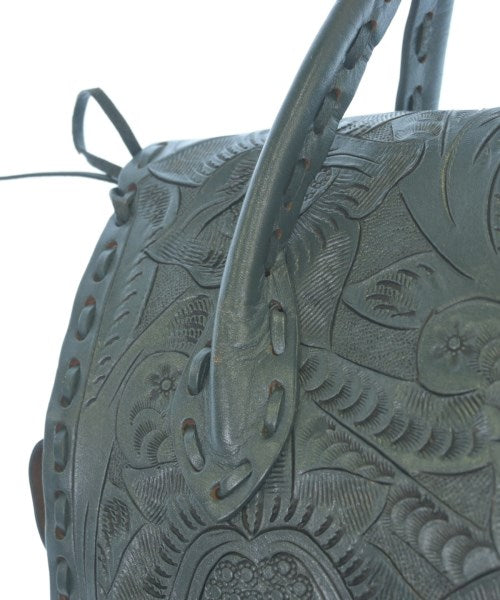 Carving Tribes กระเป๋าถือ