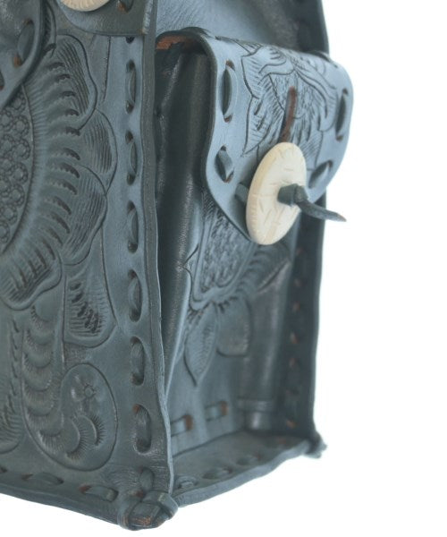 Carving Tribes กระเป๋าถือ