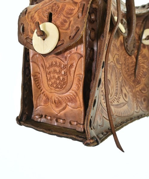 Carving Tribes กระเป๋าถือ