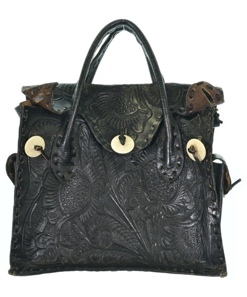 Carving Tribes กระเป๋าถือ