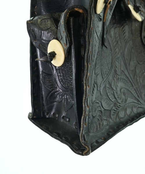 Carving Tribes กระเป๋าถือ