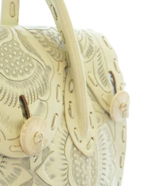 Carving Tribes กระเป๋าถือ