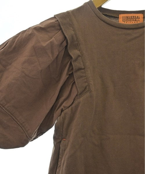 UNIVERSAL OVERALL เสื้อยืด/เสื้อท็อปส์