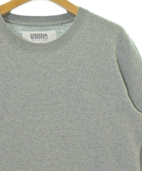 UNIVERSAL OVERALL เสื้อยืด/เสื้อท็อปส์