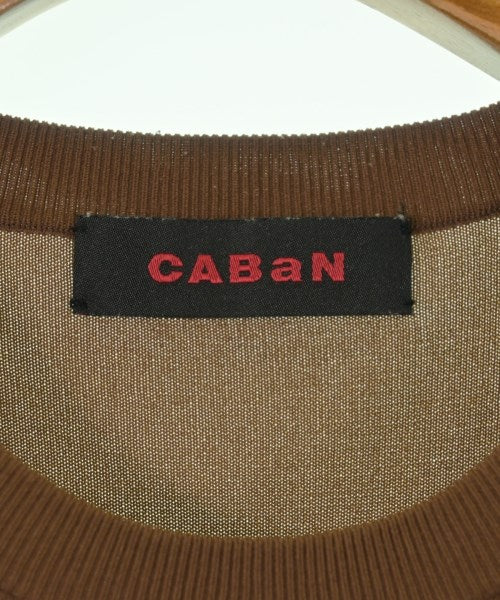 CABaN เสื้อยืด/เสื้อท็อปส์