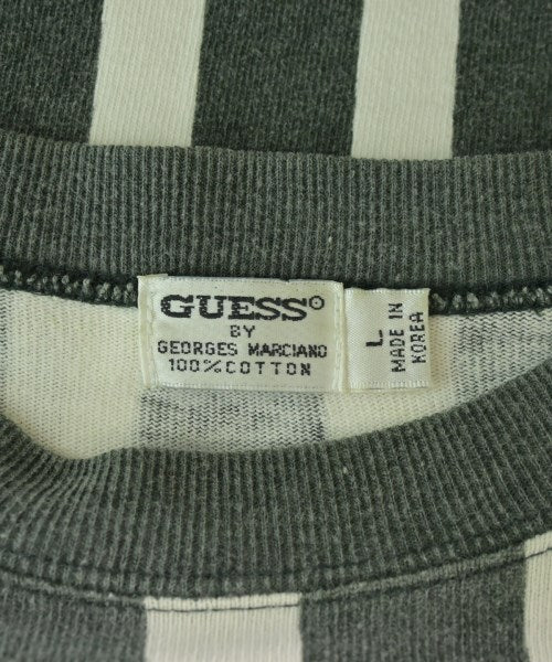 GUESS เสื้อยืด/เสื้อท็อปส์