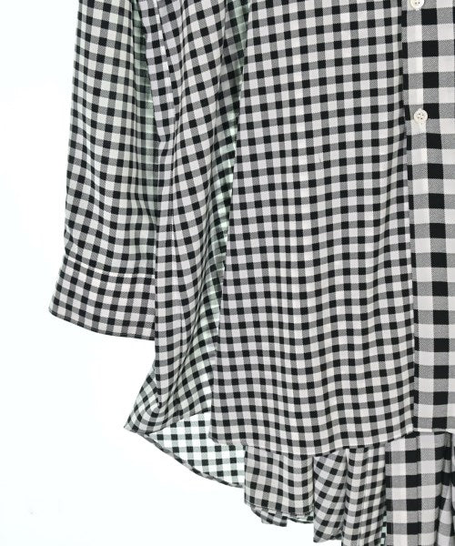 COMME des GARCONS เสื้อลำลอง