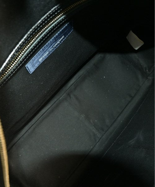 COMME des GARCONS กระเป๋าใส่อุปกรณ์ขนาดใหญ่