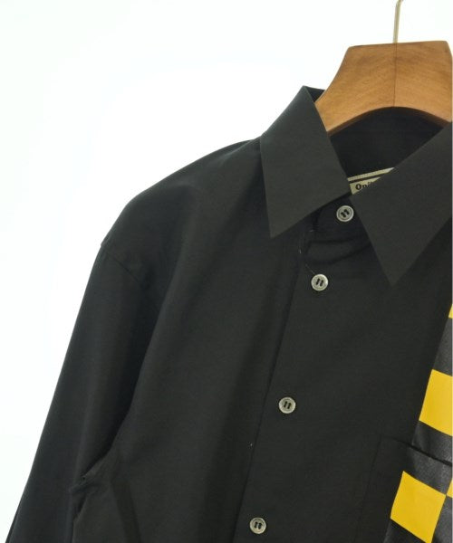 COMME des GARCONS เสื้อลำลอง