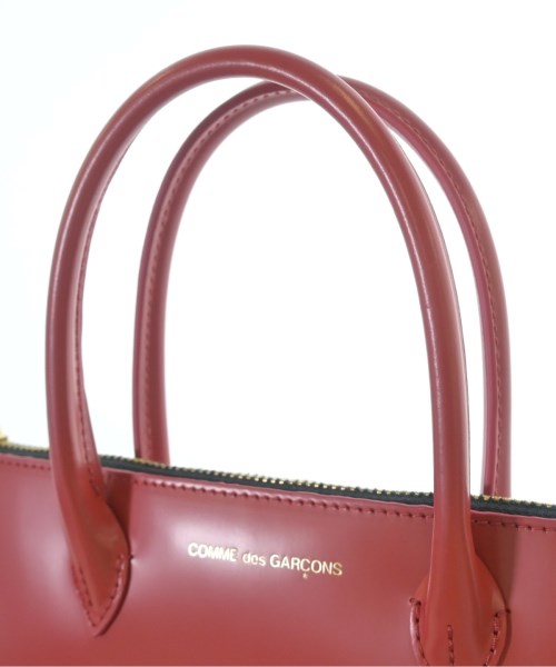 COMME des GARCONS กระเป๋าถือ