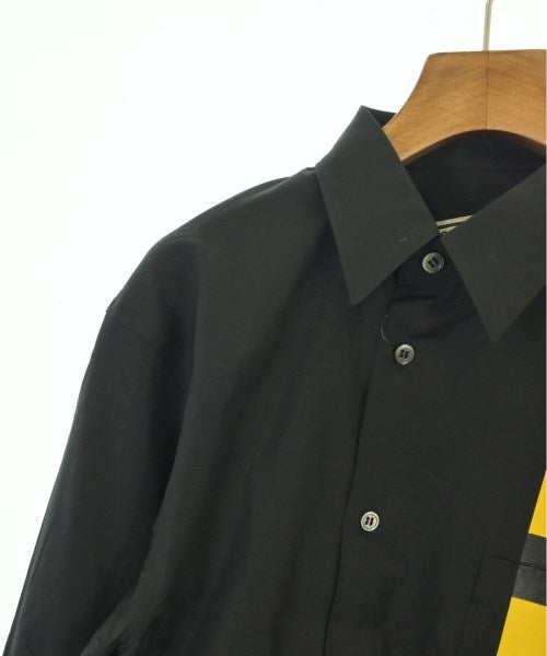 COMME des GARCONS เสื้อลำลอง