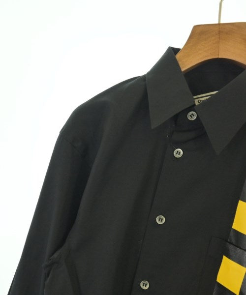 COMME des GARCONS เสื้อลำลอง