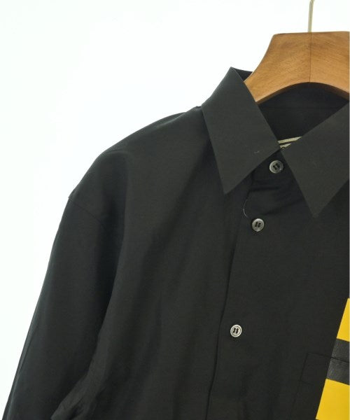 COMME des GARCONS เสื้อลำลอง
