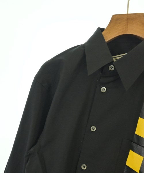 COMME des GARCONS เสื้อลำลอง