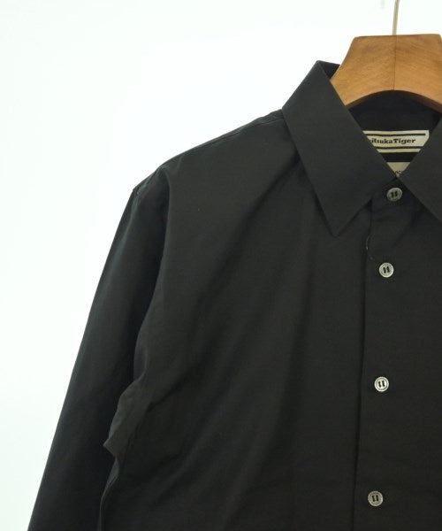 COMME des GARCONS เสื้อลำลอง