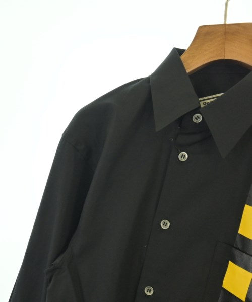 COMME des GARCONS เสื้อลำลอง