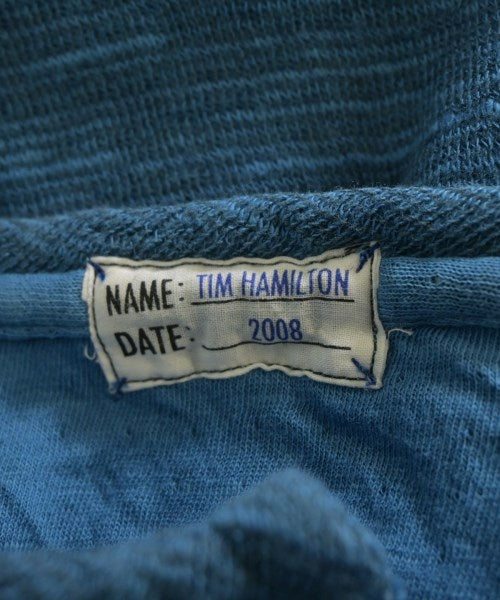 TIM HAMILTON เสื้อยืด/เสื้อท็อปส์