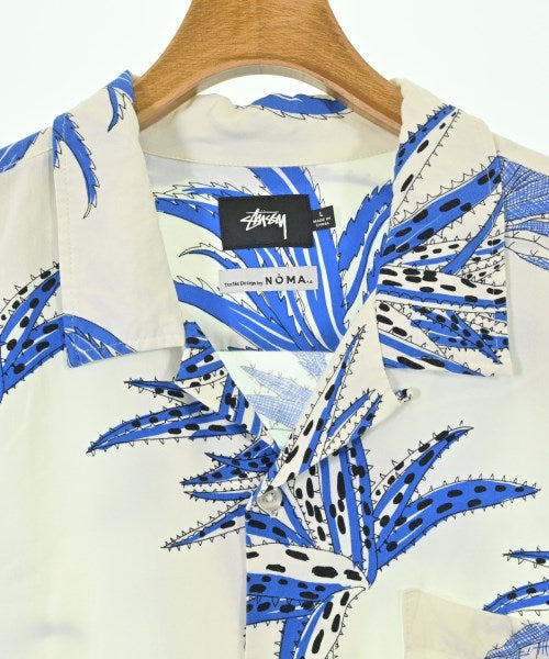 STUSSY เสื้อลำลอง