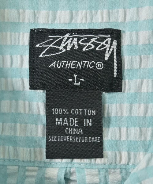 STUSSY เสื้อลำลอง