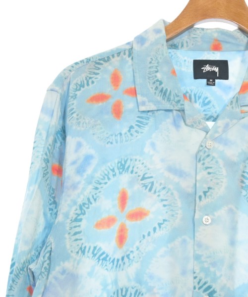 STUSSY เสื้อลำลอง