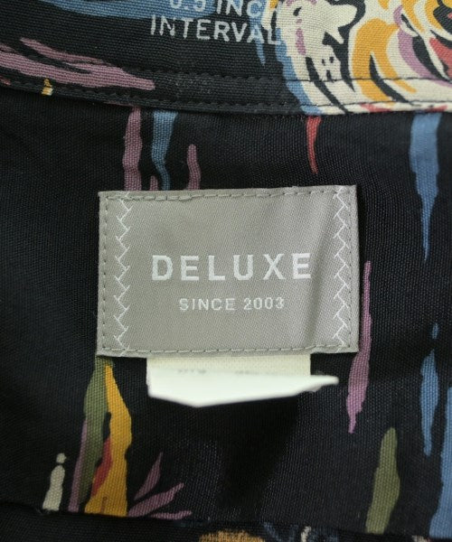 Deluxe เสื้อลำลอง