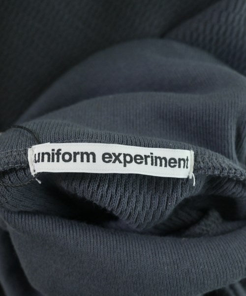 uniform experiment เสื้อยืด/เสื้อท็อปส์