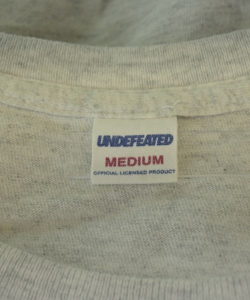 UNDEFEATED เสื้อยืด/เสื้อท็อปส์