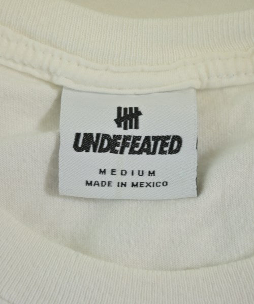 UNDEFEATED เสื้อยืด/เสื้อท็อปส์