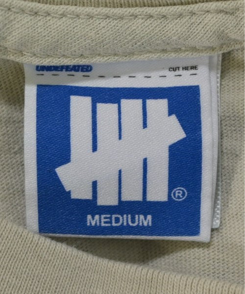 UNDEFEATED เสื้อยืด/เสื้อท็อปส์