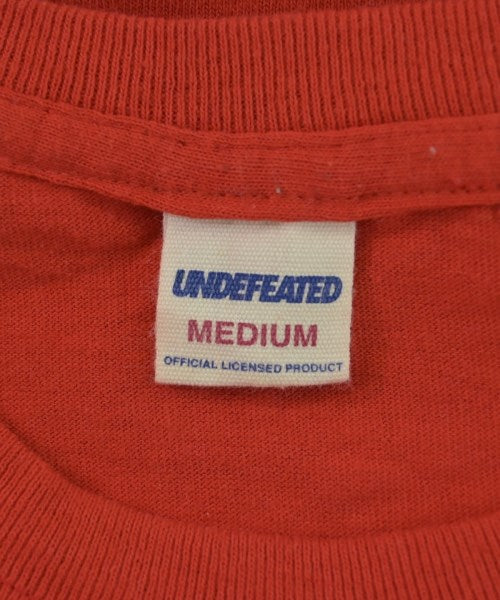 UNDEFEATED เสื้อยืด/เสื้อท็อปส์