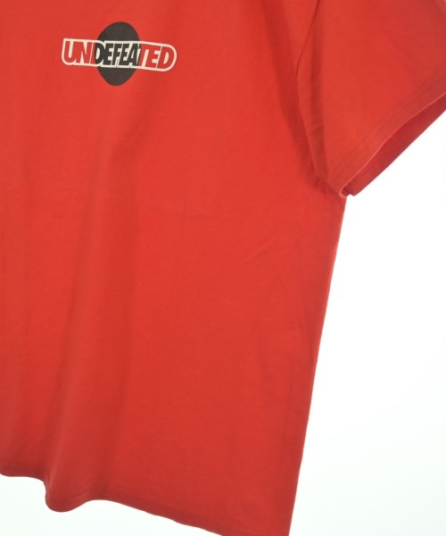 UNDEFEATED เสื้อยืด/เสื้อท็อปส์