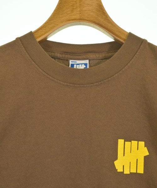 UNDEFEATED เสื้อยืด/เสื้อท็อปส์