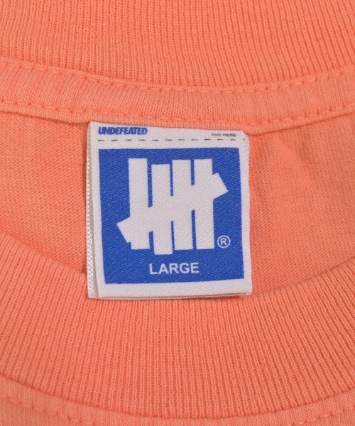 UNDEFEATED เสื้อยืด/เสื้อท็อปส์