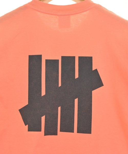 UNDEFEATED เสื้อยืด/เสื้อท็อปส์