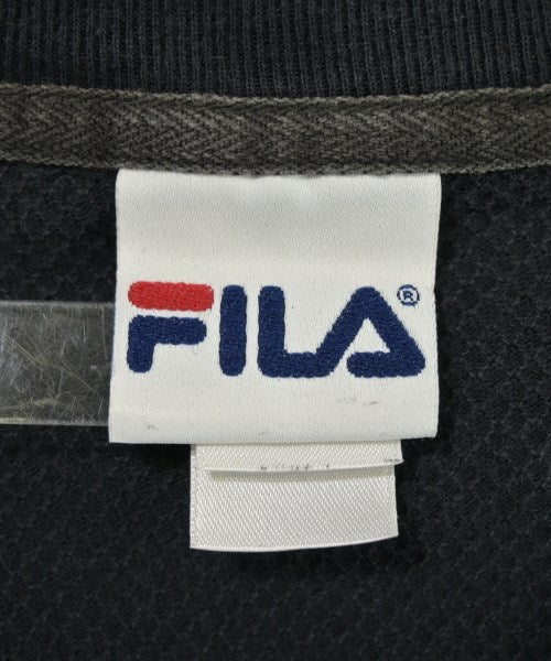 FILA เสื้อยืด/เสื้อท็อปส์