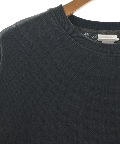 FILA เสื้อยืด/เสื้อท็อปส์