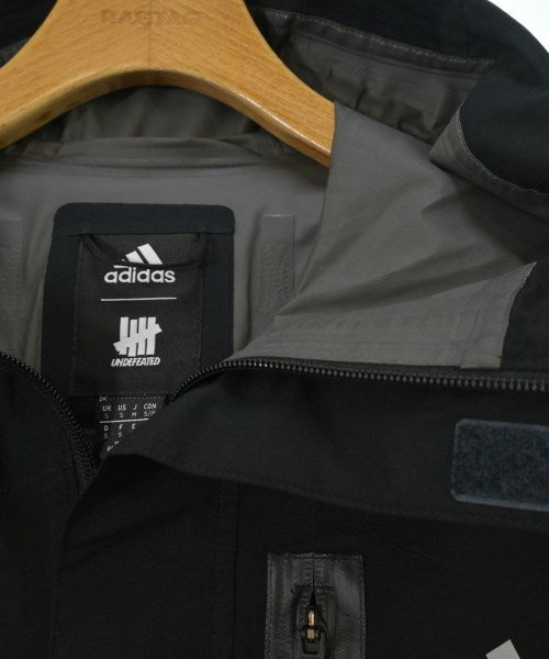 UNDEFEATED เสื้อพาร์กาภูเขา