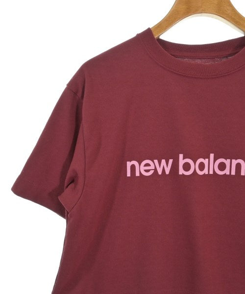New Balance เสื้อยืด/เสื้อท็อปส์