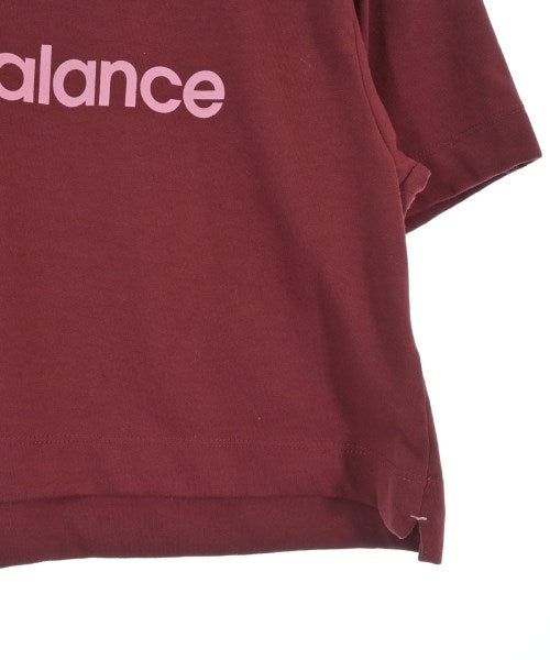 New Balance เสื้อยืด/เสื้อท็อปส์