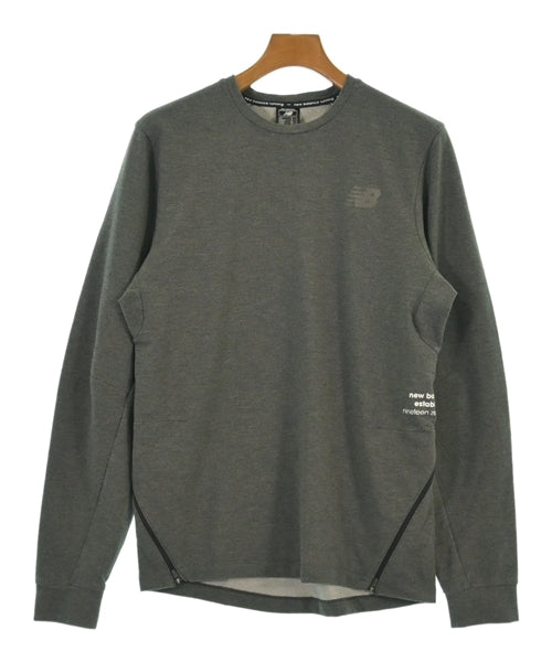 New Balance เสื้อยืด/เสื้อท็อปส์